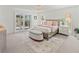 Spacious bedroom with sliding doors to patio, plush carpet, and neutral decor at 5107 86Th Street W Ct, Bradenton, FL 34210