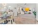 Bright dining area with glass-top table and seating for four at 5107 86Th Street W Ct, Bradenton, FL 34210