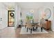 Elegant dining room with decorative furniture and ample natural light at 5107 86Th Street W Ct, Bradenton, FL 34210