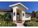 Inviting home exterior with landscaped walkway and entry at 5107 86Th Street W Ct, Bradenton, FL 34210