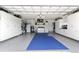 Large garage with utility sink, plenty of storage and epoxy floor at 5107 86Th Street W Ct, Bradenton, FL 34210