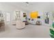Open living space featuring a comfortable sofa and armchairs at 5107 86Th Street W Ct, Bradenton, FL 34210