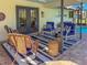 Relaxing poolside patio with comfortable seating and striped rug at 5107 86Th Street W Ct, Bradenton, FL 34210