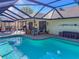 Relaxing pool and patio area with covered seating at 5107 86Th Street W Ct, Bradenton, FL 34210