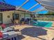 Enjoy this refreshing pool with a screened patio and lounge chairs at 5107 86Th Street W Ct, Bradenton, FL 34210