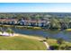 Aerial view of building and community near golf course at 5240 Hyland Hills Ave # 1411, Sarasota, FL 34241