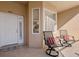 Condo entryway with seating area and welcoming mat at 5240 Hyland Hills Ave # 1411, Sarasota, FL 34241