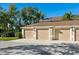 Three-car garage with attached condo units at 5240 Hyland Hills Ave # 1411, Sarasota, FL 34241