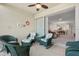 Relaxing lanai with wicker furniture and access to living area at 5240 Hyland Hills Ave # 1411, Sarasota, FL 34241