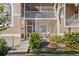 Ground level condo with a screened patio at 5240 Hyland Hills Ave # 1411, Sarasota, FL 34241