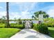 Wooden observation deck overlooking a tranquil lake at 5240 Hyland Hills Ave # 1411, Sarasota, FL 34241
