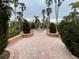 Attractive courtyard with fountain and lush landscaping at 5401 Bentgrass Dr # 1-204, Sarasota, FL 34235