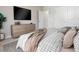 Cozy bedroom with a dresser and comfortable bedding at 5587 Farmington Ave, North Port, FL 34288