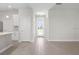 Bright and airy entryway with tile flooring and neutral color palette at 5587 Farmington Ave, North Port, FL 34288