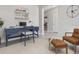 Home office with built-in desk and comfortable seating at 5587 Farmington Ave, North Port, FL 34288