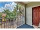 Screened balcony overlooking a lush green area at 5700 Bentgrass Dr # 16-211, Sarasota, FL 34235
