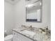 Bathroom boasts a granite countertop and modern sink at 5700 Bentgrass Dr # 16-211, Sarasota, FL 34235