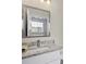 Bathroom with vanity and granite countertop at 5700 Bentgrass Dr # 16-211, Sarasota, FL 34235