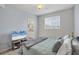 Bright bedroom with a TV, double bed and access to a bathroom at 5700 Bentgrass Dr # 16-211, Sarasota, FL 34235