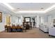 Community room with dining table and pool table at 5700 Bentgrass Dr # 16-211, Sarasota, FL 34235