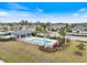 Community pool and surrounding homes at 6077 Amberly Dr, Bradenton, FL 34208