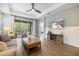 Bright living room with hardwood floors and access to backyard at 6077 Amberly Dr, Bradenton, FL 34208
