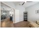 Home office with built-in shelving and adjacent to the kitchen at 6077 Amberly Dr, Bradenton, FL 34208