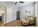 Cozy office with built-in shelving and comfortable seating at 6077 Amberly Dr, Bradenton, FL 34208