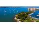 Aerial view of waterfront homes and boats at 650 Golden Gate Pt # 401, Sarasota, FL 34236