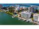 Stunning aerial view of waterfront property and marina at 650 Golden Gate Pt # 401, Sarasota, FL 34236