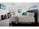 Main bedroom with king bed and ample natural light at 650 Golden Gate Pt # 401, Sarasota, FL 34236