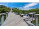 Boardwalk path over water at 650 Golden Gate Pt # 401, Sarasota, FL 34236