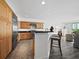 Well-equipped kitchen with breakfast bar and island at 650 Golden Gate Pt # 401, Sarasota, FL 34236