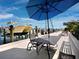 Enjoy waterfront dining on this patio with marina views at 650 Golden Gate Pt # 401, Sarasota, FL 34236