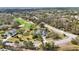 Single-Gathering home with a pool and screened enclosure, near a golf course at 6702 Pinehurst Pl, Bradenton, FL 34202