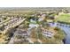 Aerial view of community clubhouse and parking lot at 6702 Pinehurst Pl, Bradenton, FL 34202