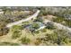 Single-Gathering home with a pool and screened enclosure, surrounded by trees at 6702 Pinehurst Pl, Bradenton, FL 34202