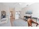 Home office with desk, chair, large window and bookshelves at 6702 Pinehurst Pl, Bradenton, FL 34202