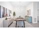Elegant dining room with a modern chandelier and stylish decor at 6702 Pinehurst Pl, Bradenton, FL 34202