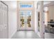 Bright and spacious entryway with double doors leading to the backyard at 6702 Pinehurst Pl, Bradenton, FL 34202