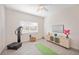 Home gym with whole body vibration machine and yoga mat at 6702 Pinehurst Pl, Bradenton, FL 34202