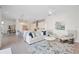 Open concept living room and kitchen with modern finishes at 6702 Pinehurst Pl, Bradenton, FL 34202