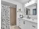 Updated bathroom with white vanity, quartz countertop, and walk-in shower at 6807 Stone River Rd # 204, Bradenton, FL 34203