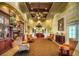 Elegant clubhouse lobby with seating and fireplace at 6807 Stone River Rd # 204, Bradenton, FL 34203