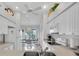 White kitchen with stainless steel appliances at 6807 Stone River Rd # 204, Bradenton, FL 34203
