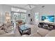 Bright living room with vaulted ceiling and view to bedroom at 6807 Stone River Rd # 204, Bradenton, FL 34203