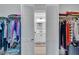 Large walk-in closet with double hanging rods and shelving at 6807 Stone River Rd # 204, Bradenton, FL 34203