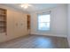 Spacious bedroom with built-in shelving and closet at 7213 Las Casas Dr, Sarasota, FL 34243