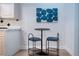 Bright kitchen nook with a small table and two chairs at 7213 Las Casas Dr, Sarasota, FL 34243