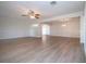 Spacious living room with light walls and wood-look floors at 7213 Las Casas Dr, Sarasota, FL 34243